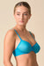 Gossard Glossies Sheer Bra Atomic Blue with seamless mesh cups and underwire support, modeled from a side angle for a flattering plunge fit.