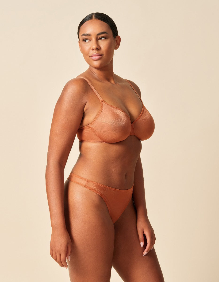 Women wearing Gossard Glossies Sunkissed Sheer Thong Panties in beige
