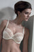Conturelle Provence Bra in beige with sheer lace full cups and floral embroidery, offering elegant support for full figure sizes.