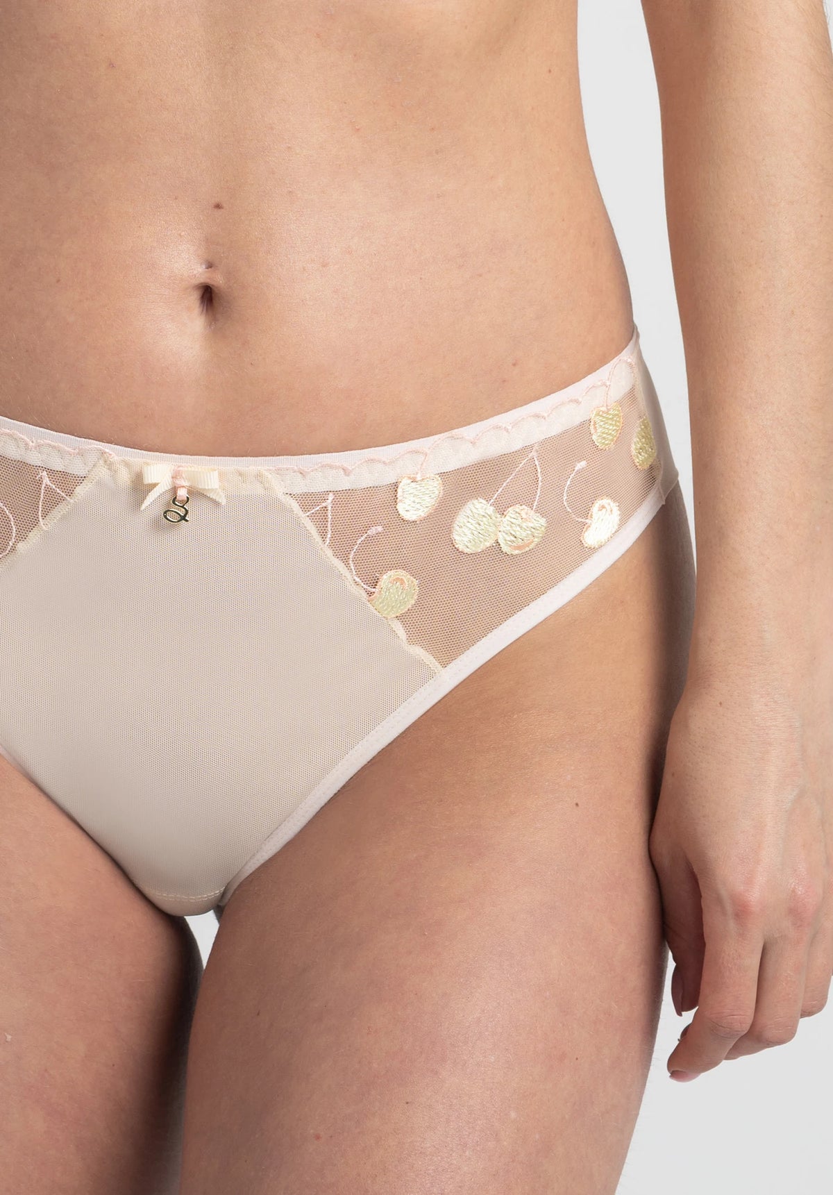 Pastel sheer Brazilian panty made of soft tulle with cherry embroidery, seamless back, cream color, size L, delicate lingerie for women