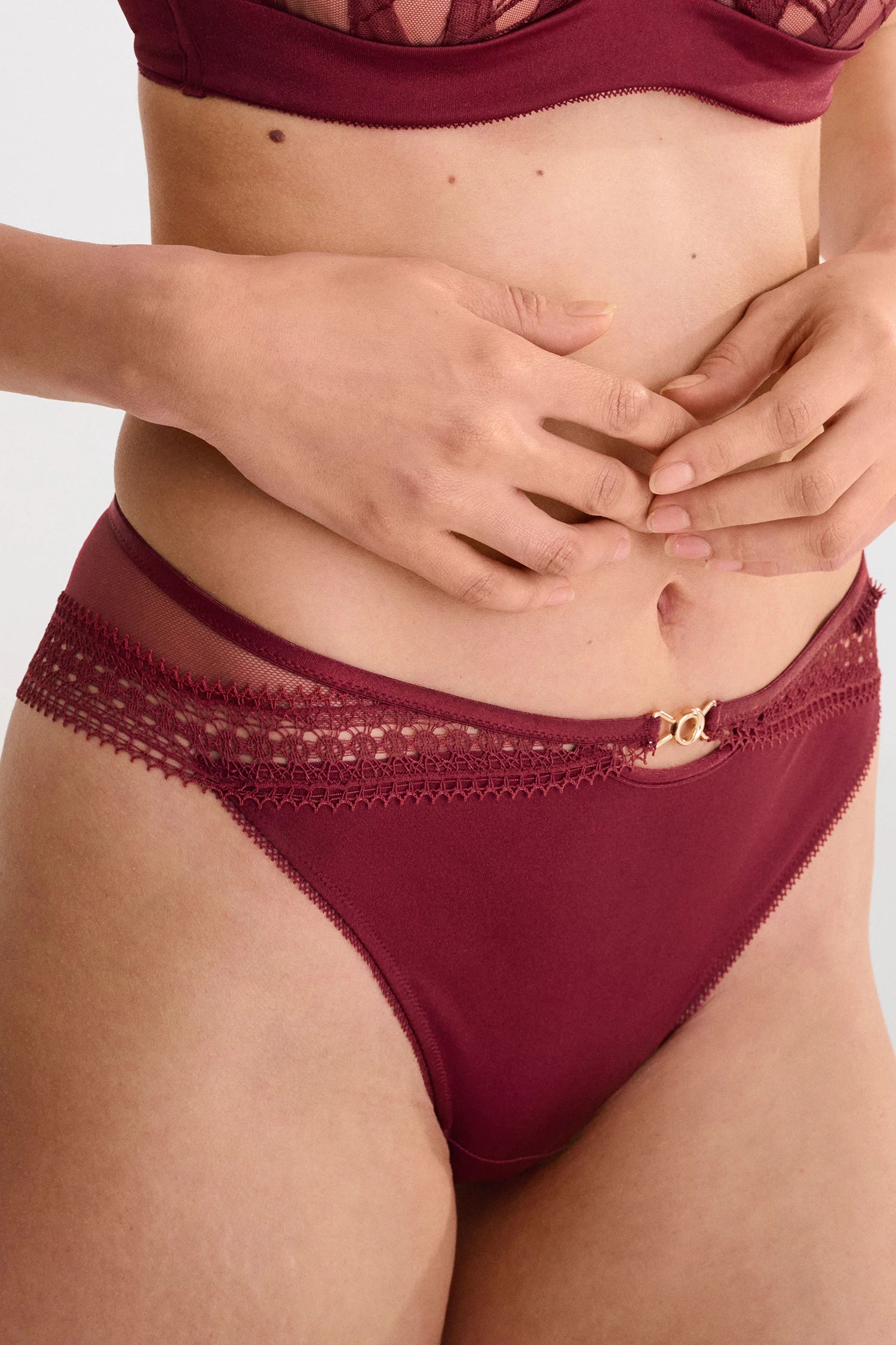 Garnet red Brazilian panty with lace details from front view