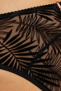 Close-up of embroidered palm leaf design on Sheer Mesh Brazilian Thong Panty Gorteks Mare, highlighting fine tulle texture.