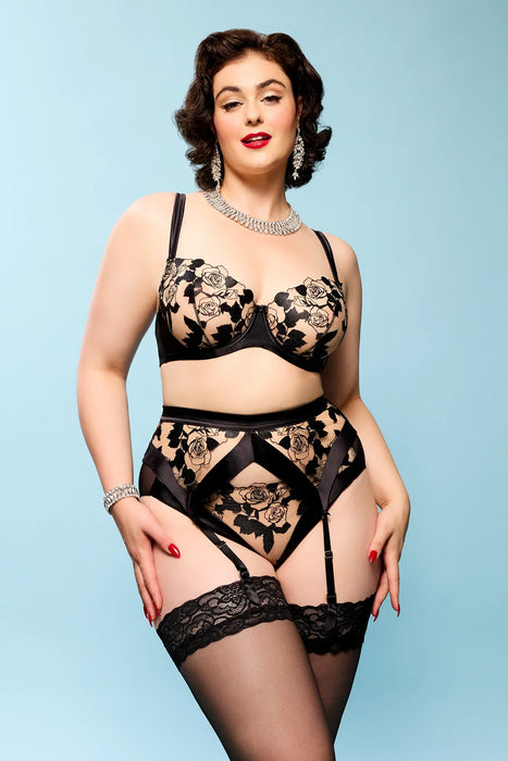 Full lingerie set featuring Dita Von Teese Rosabelle Underwire Balconette Bra Black styled with matching garter belt and stockings.