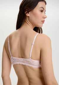 Back view of Soft Mesh Lace Bralette Rosette in Pink featuring adjustable straps and scalloped lace trim. A flirty, wireless lingerie essential.