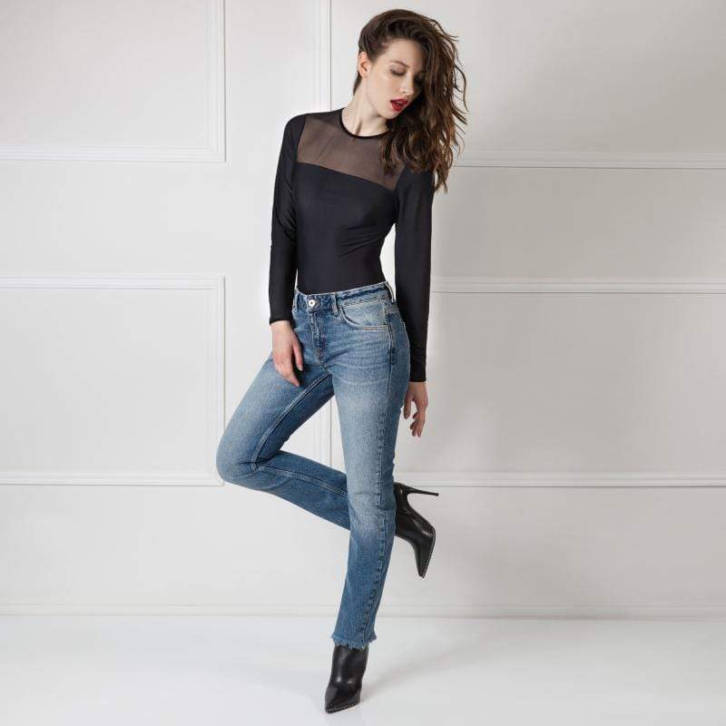 Amoralle Be Daring Bodysuit styled with jeans and heels, highlighting its versatility as luxury lingerie and fashionable outerwear.
