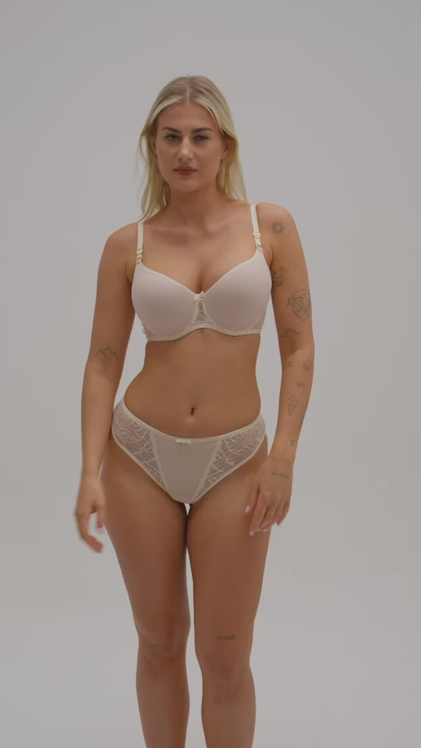 Low-Rise Mesh Brazilian Tanga Panty Amelia M300 in ivory with lace sides and mid-rise fit, modeled front view. Elegant lingerie from Samanta Amelia.