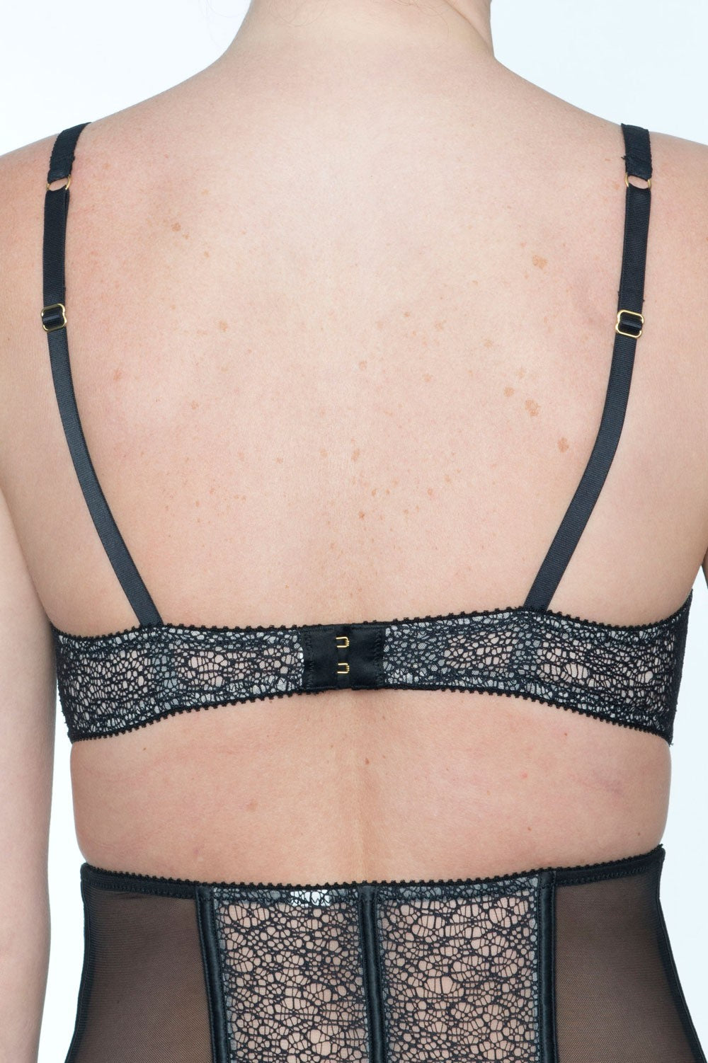 Back view of Padded Balcony Bra Addiction Provocante showing adjustable straps and hook-and-eye closure in black lace fabric.